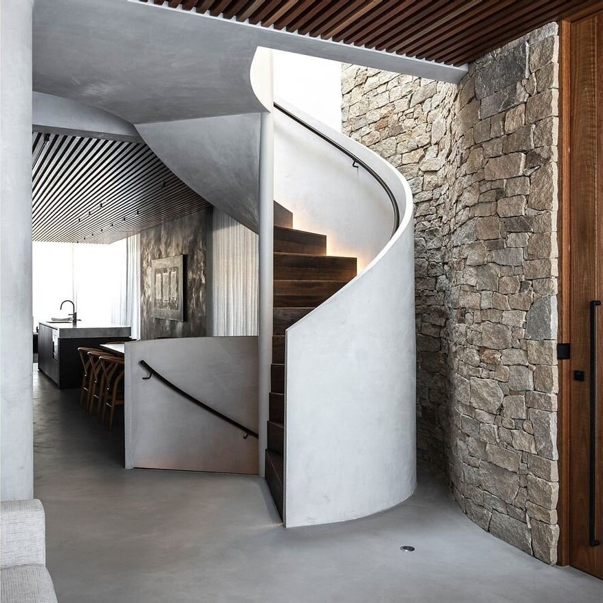 Spiral stair & stone feature wall — micro cement project in AI